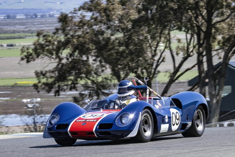 Group four Michael Malone's 1966 Elva Mk8 exiting turn two. Dennis Gray